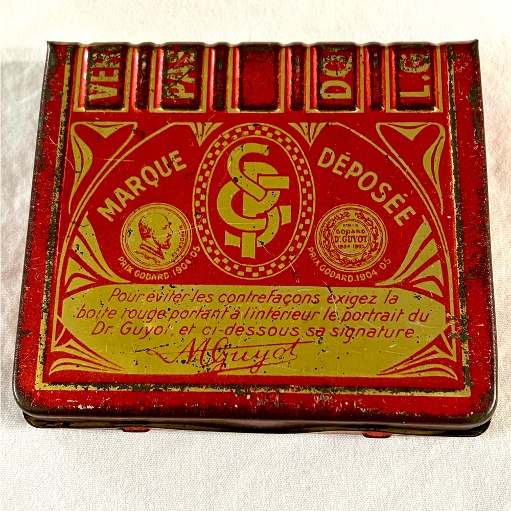 Vintage sheet metal medicine tin